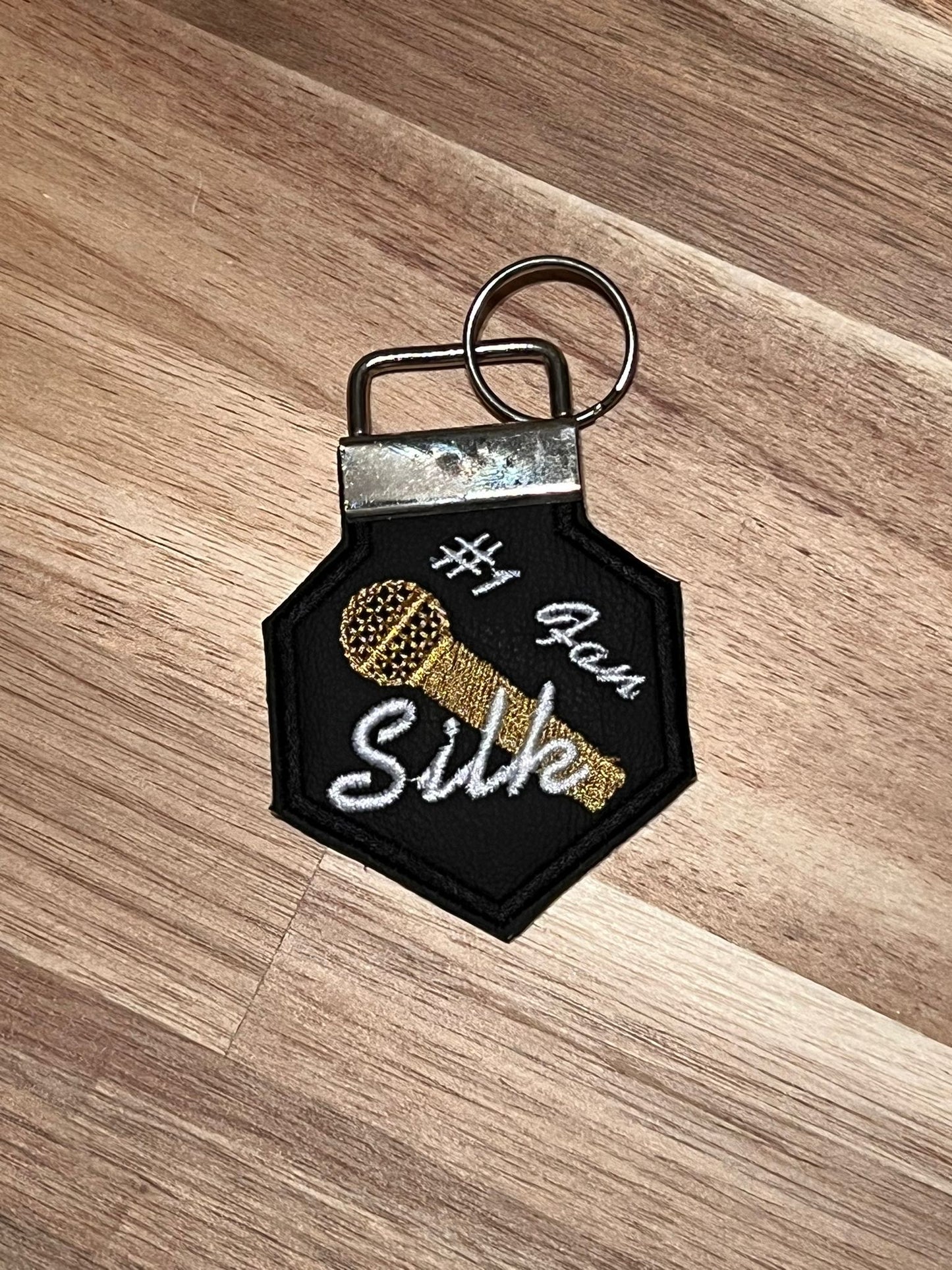 Silk Fans KeyChains (Black Border)