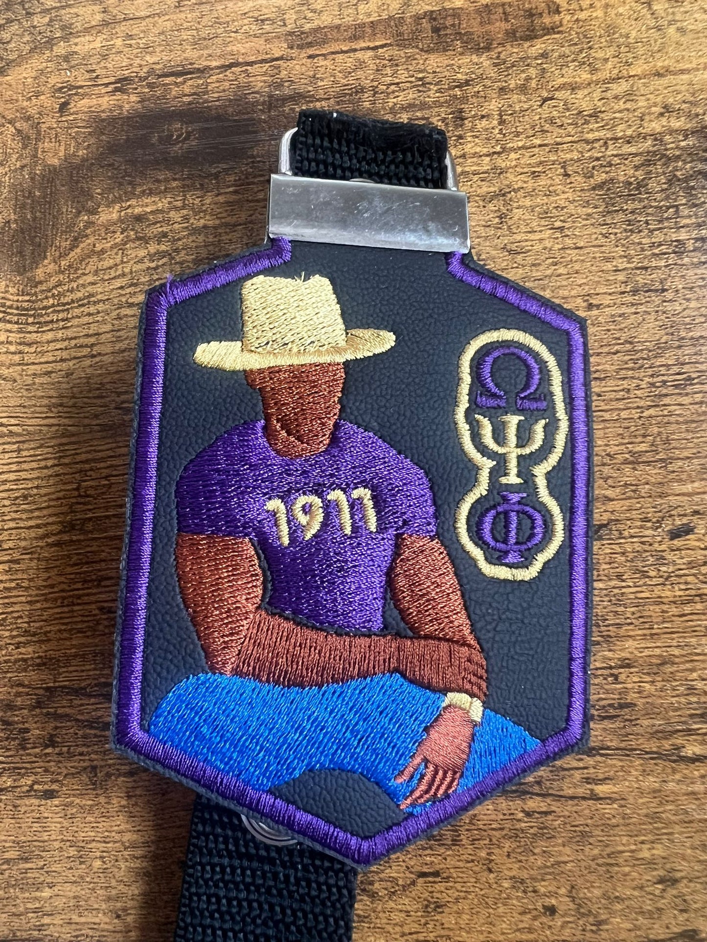 Omega Psi Phi Avatar Bag Tag (Brown)/Purple Border/Strap