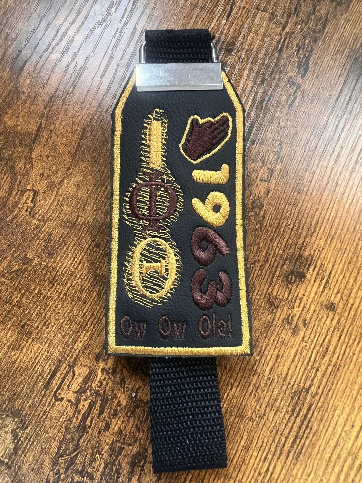 Iota Phi Theta Tag (Gold Border) Brown Hand  Strap BUY  NOW