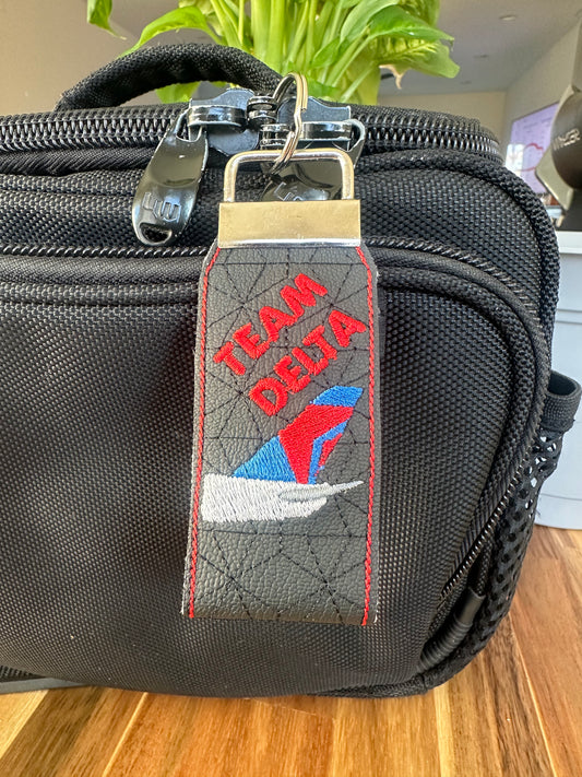 Delta Tail Themed Keychain Fob