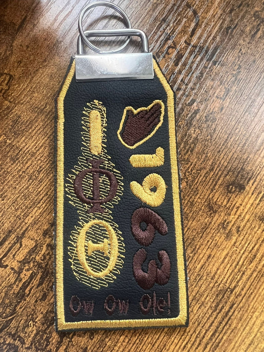 Iota Phi Theta Tag (Gold Border) Brown Hand KeyRing BUY NOW